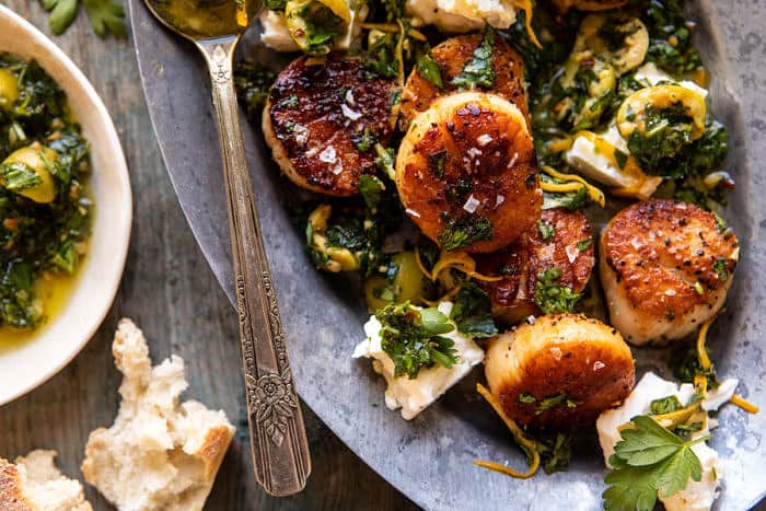 overhead horizontal photo of Herbed Garlic Butter Scallops with Lemony Feta Dressing 