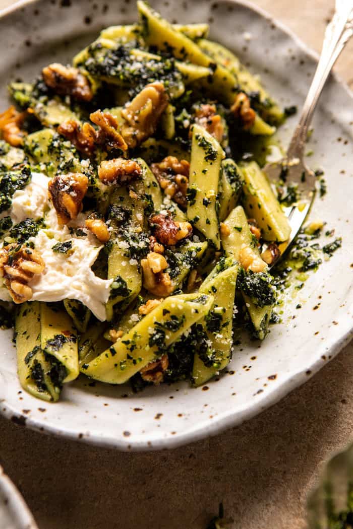 side angled photo of Herby Kale Pesto Pasta with Buttery Walnuts