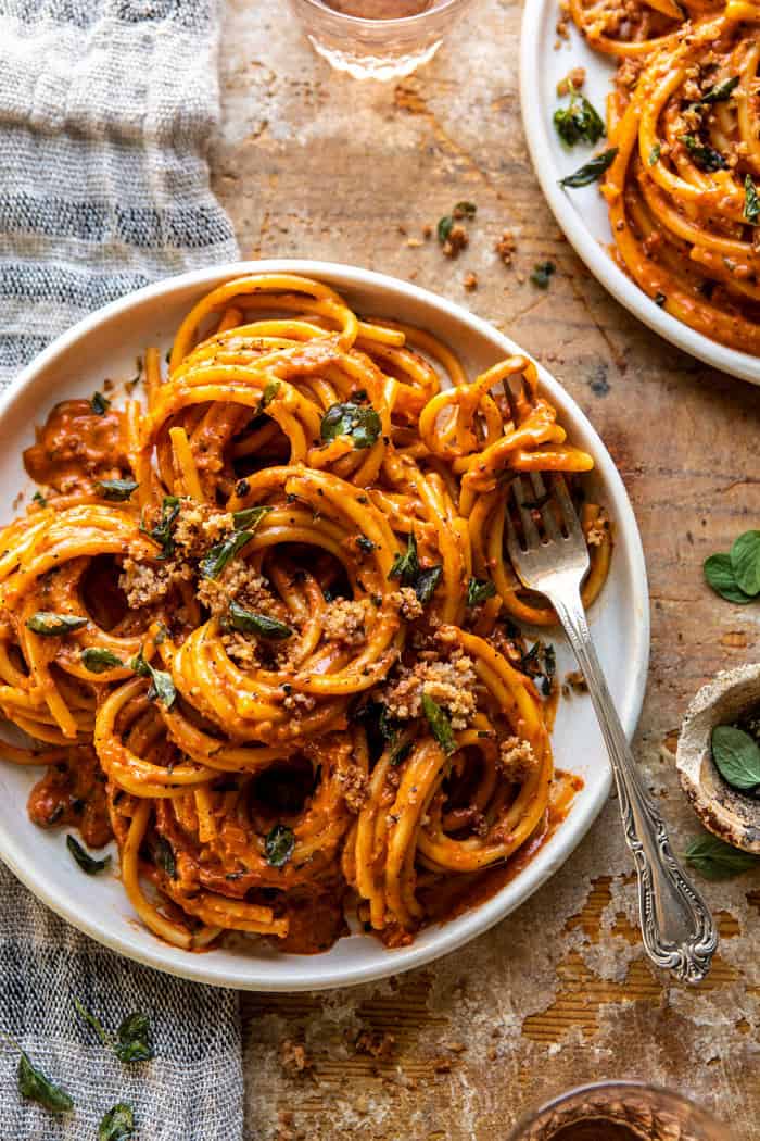 overhead close up photo of Roasted Red Pepper Alla Vodka Pasta with Cheesy Oregano Breadcrumbs 