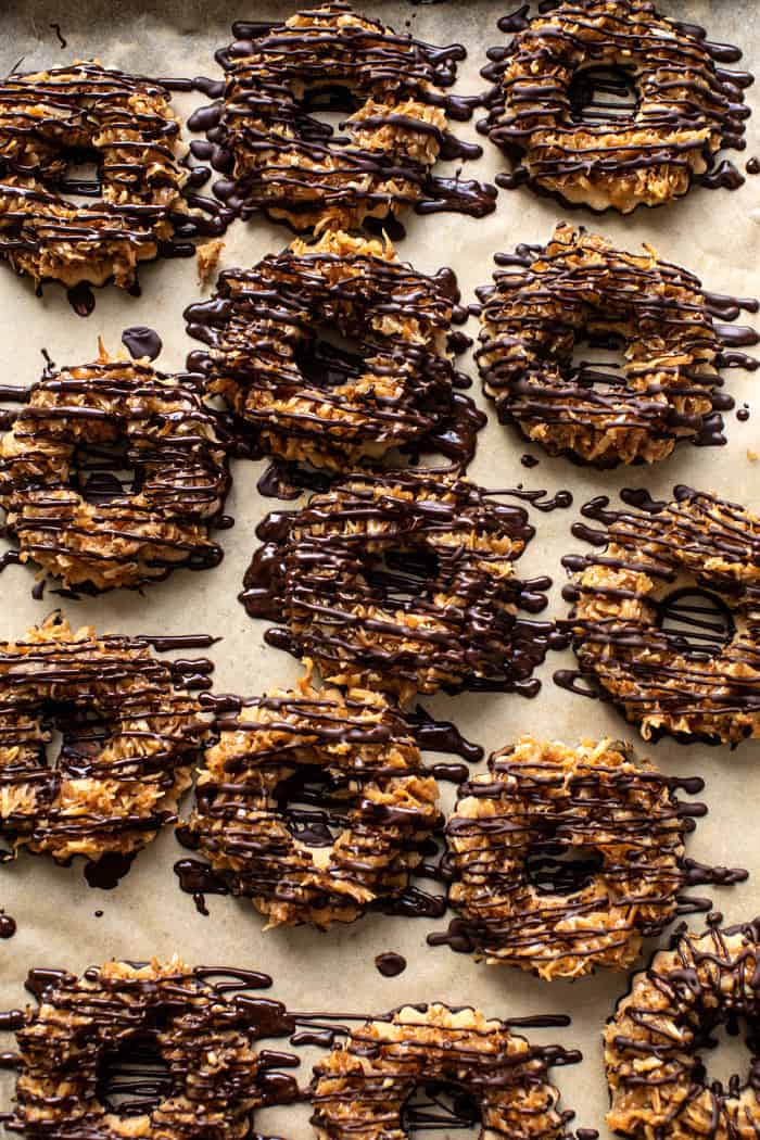 prep photo of Healthyish Homemade Samoas Cookies on baking sheet after adding chocolate