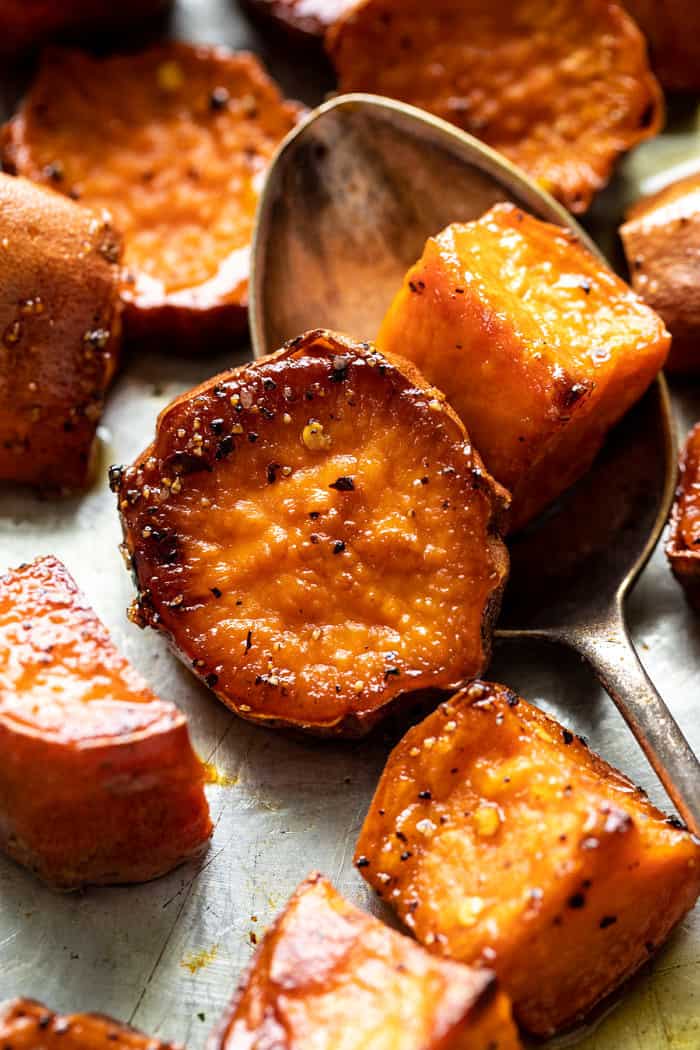 Honey'd Sweet Potatoes after roasting sitting on sheet pan