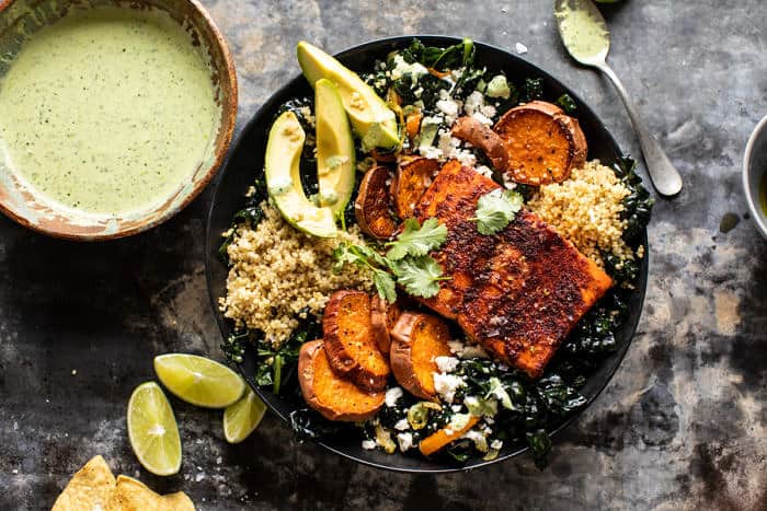 overhead horizontal photo of Sheet Pan Chipotle Salmon with Cilantro Lime Special Sauce | halfbakedharvest.com