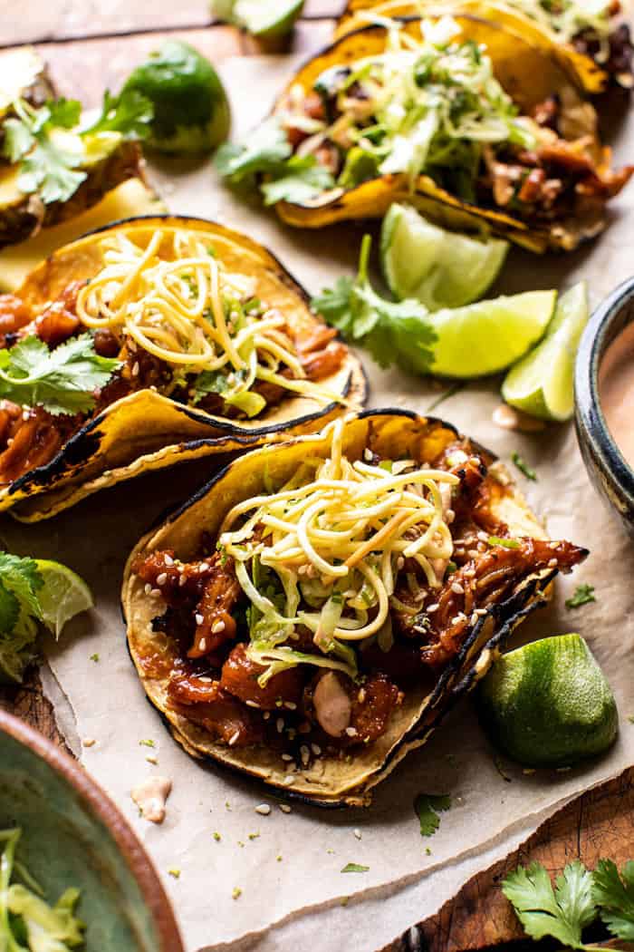 side angled photo of Slow Cooker Braised Hawaiian Pineapple Chicken Tacos