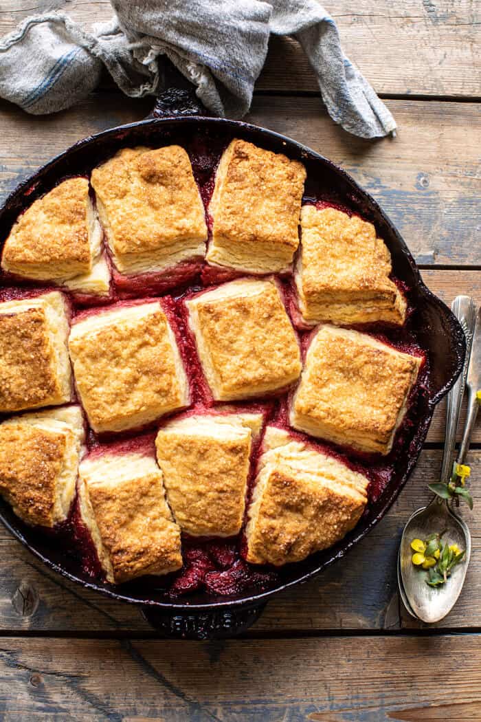 overhead photo of Skillet Strawberry Bourbon Cobbler with Layered Cream Cheese Biscuits 