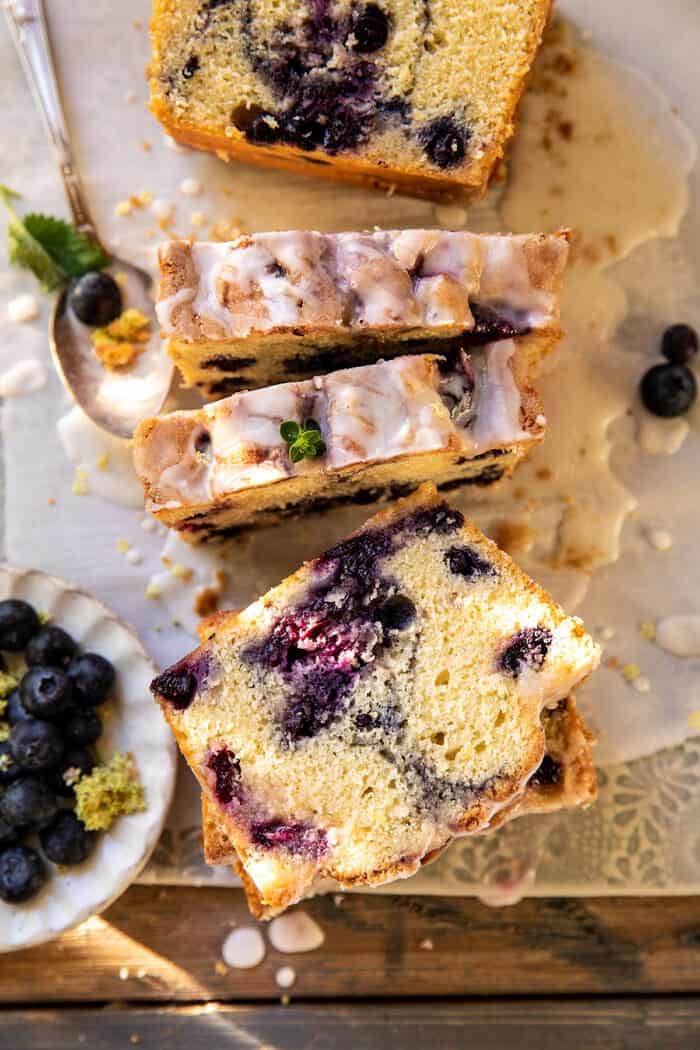 overhead close up photo of Blueberry Lemon Thyme Cake slices cut