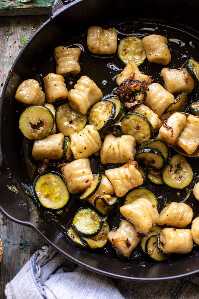 overhead photo of Cauliflower Gnocchi with Crispy Zucchini in skillet before plating 