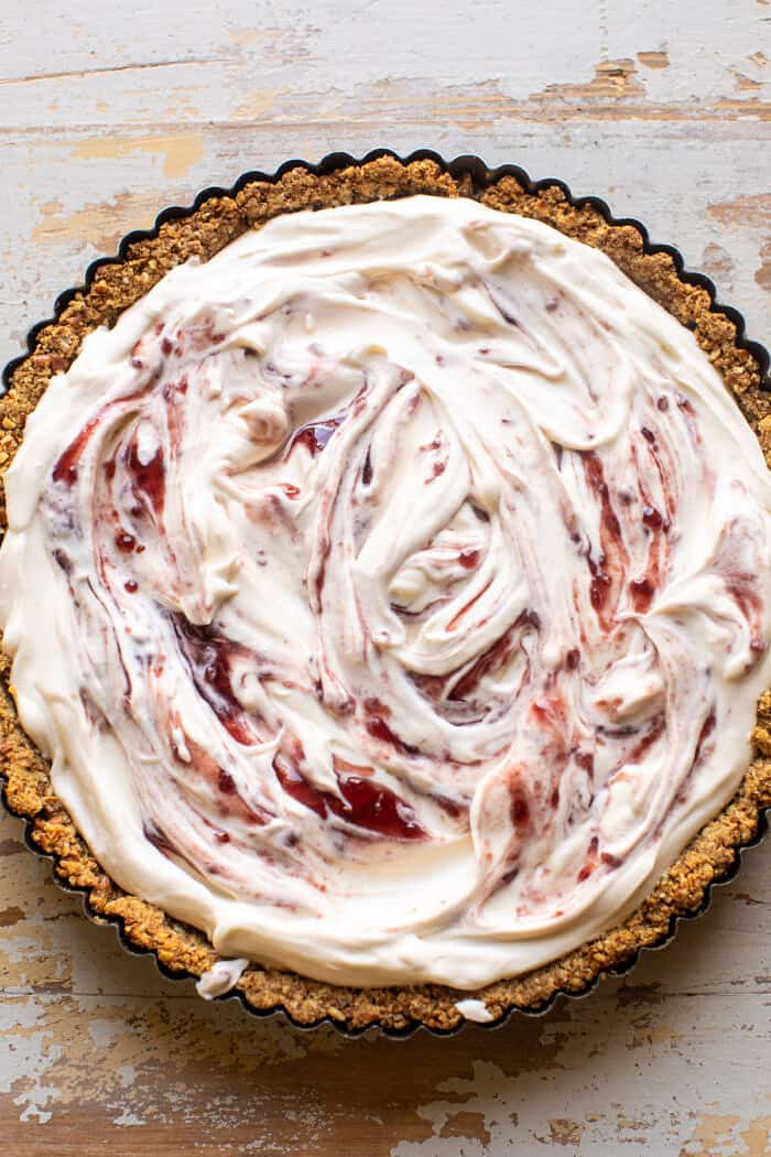Double Strawberry Pretzel Pie | halfbakedharvest.com prep photo of Double Strawberry Pretzel Pie before chilling