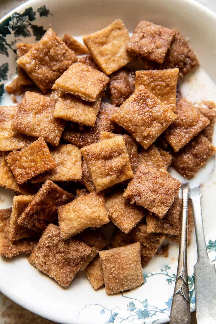 overhead close up photo of Homemade Cinnamon Toast Crunch in bowl with milk 