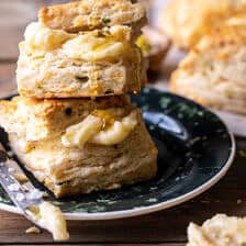 Layered Jalapeño Cheddar Biscuits with Salted Honey Butter.