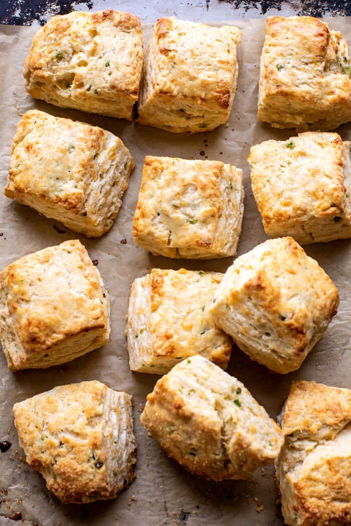 overhead photo of Layered Jalapeño Cheddar Biscuits on baking sheet 