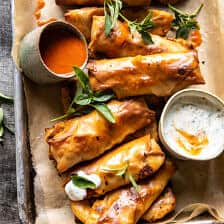 Baked Buffalo Chicken Egg Rolls with Cilantro Lime Ranch.