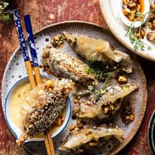 Crispy Sesame Ginger Potstickers with Chive Chili Sauce.