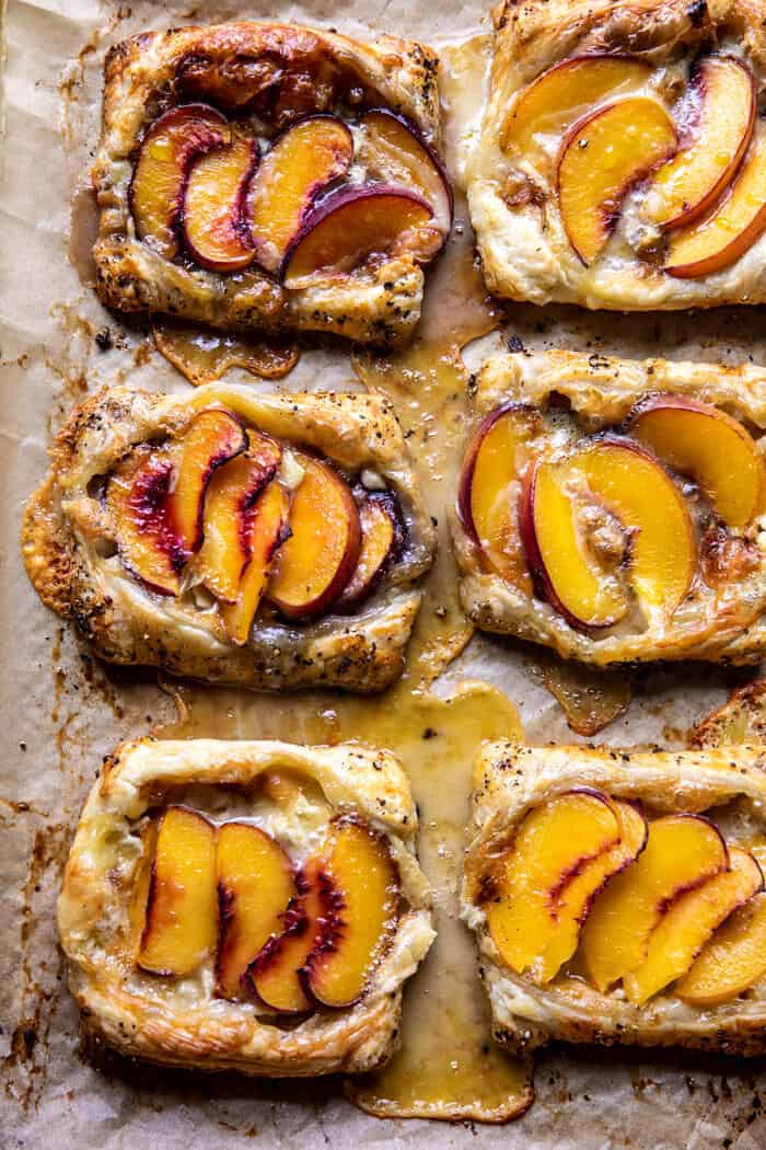 overhead photo of Peach Brie Pastry Tarts on baking sheet after baking