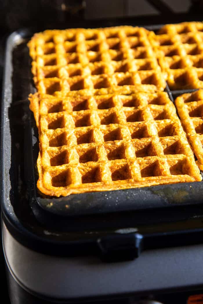 prep photo of the Cider Pumpkin Waffles cooking in the waffle iron 