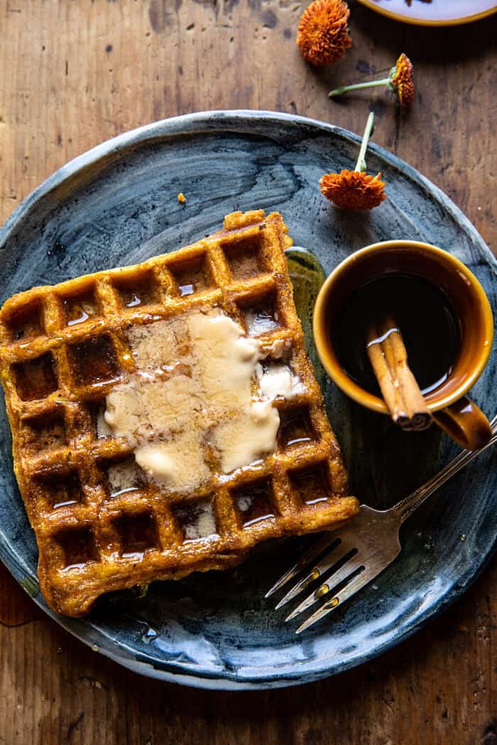 overhead photo of Cider Pumpkin Waffles with Salted Maple Butter