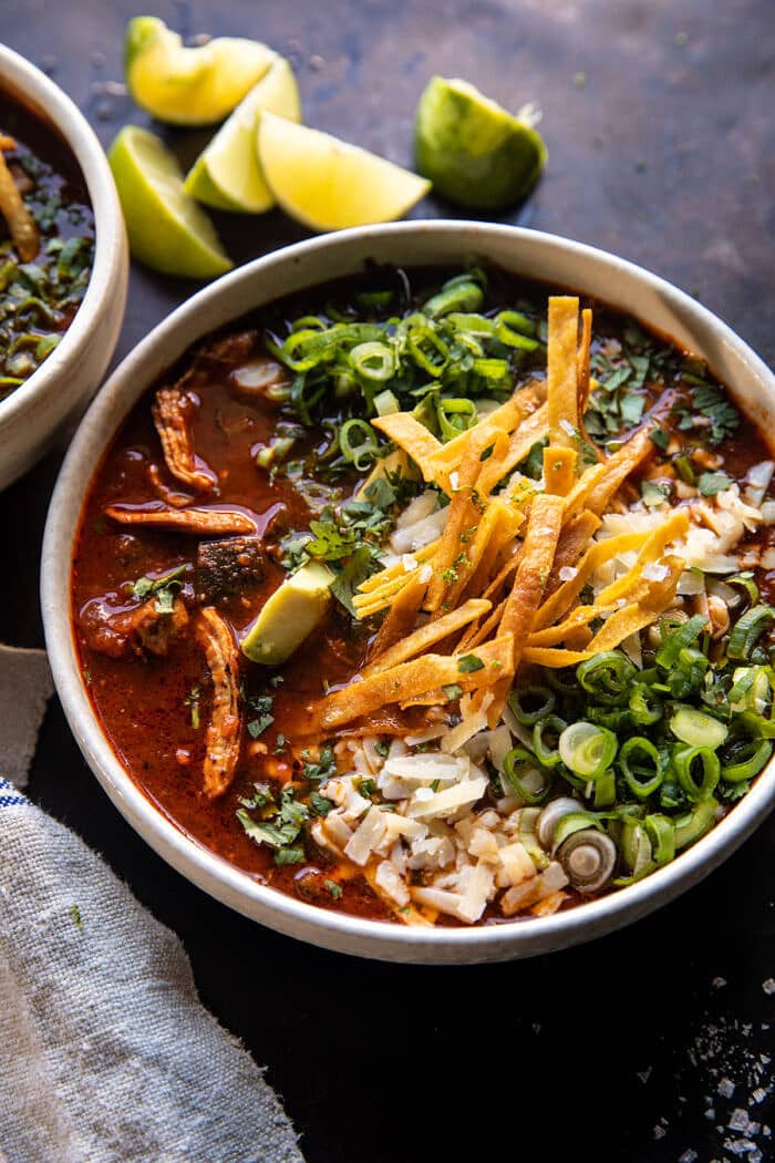 side angled photo of Slow Cooker Chipotle Chicken Tortilla Soup with Salty Lime Chips