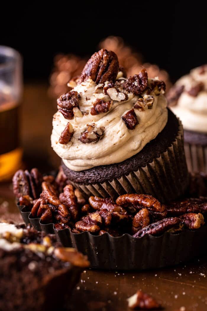 side angled photo of Chocolate Bourbon Pecan Pie Cupcakes with Butter Pecan Frosting 