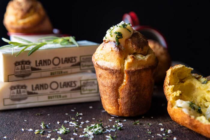 side angled horizontal photo of Salted Rosemary Popovers with Honey Butter | halfbakedharvest.com