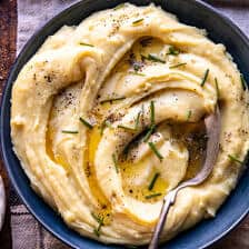 Slow Cooker Cheesy Garlic Herb Mashed Potatoes | halfbakedharvest.com