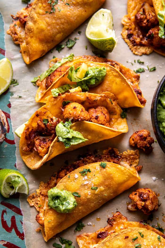 overhead photo of Crispy Cauliflower Tinga Tacos with Honey Lime Avocado Crema