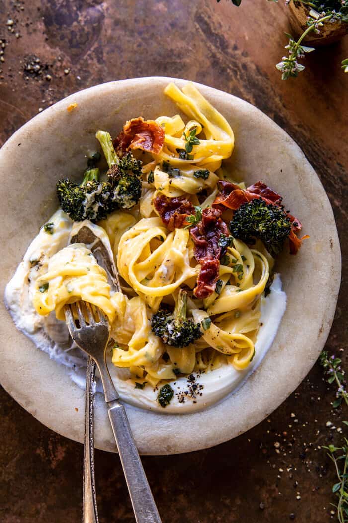 overhead photo of Roasted Broccoli Pasta Carbonara with Crispy Prosciutto and Whipped Ricotta 