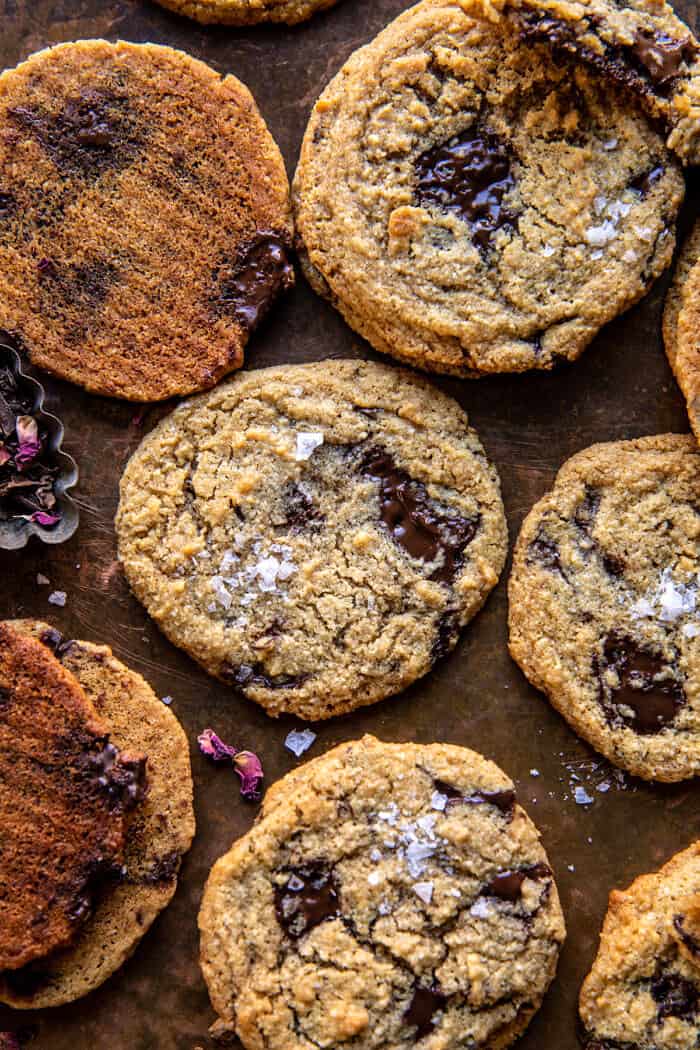 overhead close up photo of Salted Tahini Butter Chocolate Chip Cookies