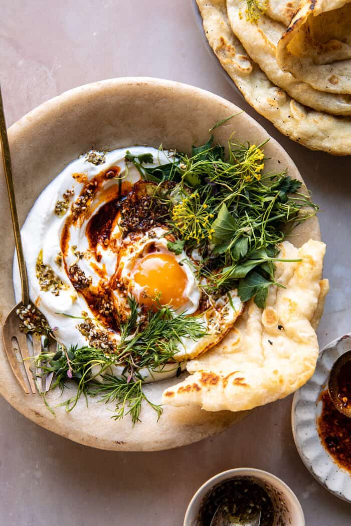 overhead photo of Za’atar Eggs with Lemony Yogurt and Herbs