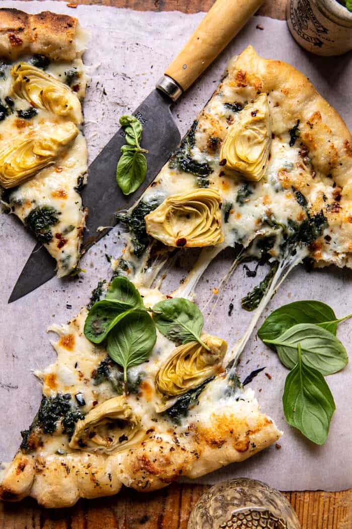 Spinach and Artichoke Pizza with Cheesy Bread Crust | halfbakedharvest.com