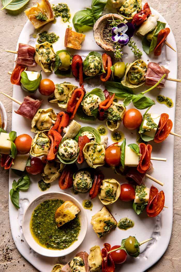 overhead photo of Antipasto Tortellini Skewers with Lemon Basil Vinaigrette