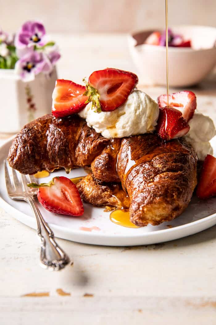Baked Strawberry and Cream Stuffed Croissant French Toast.